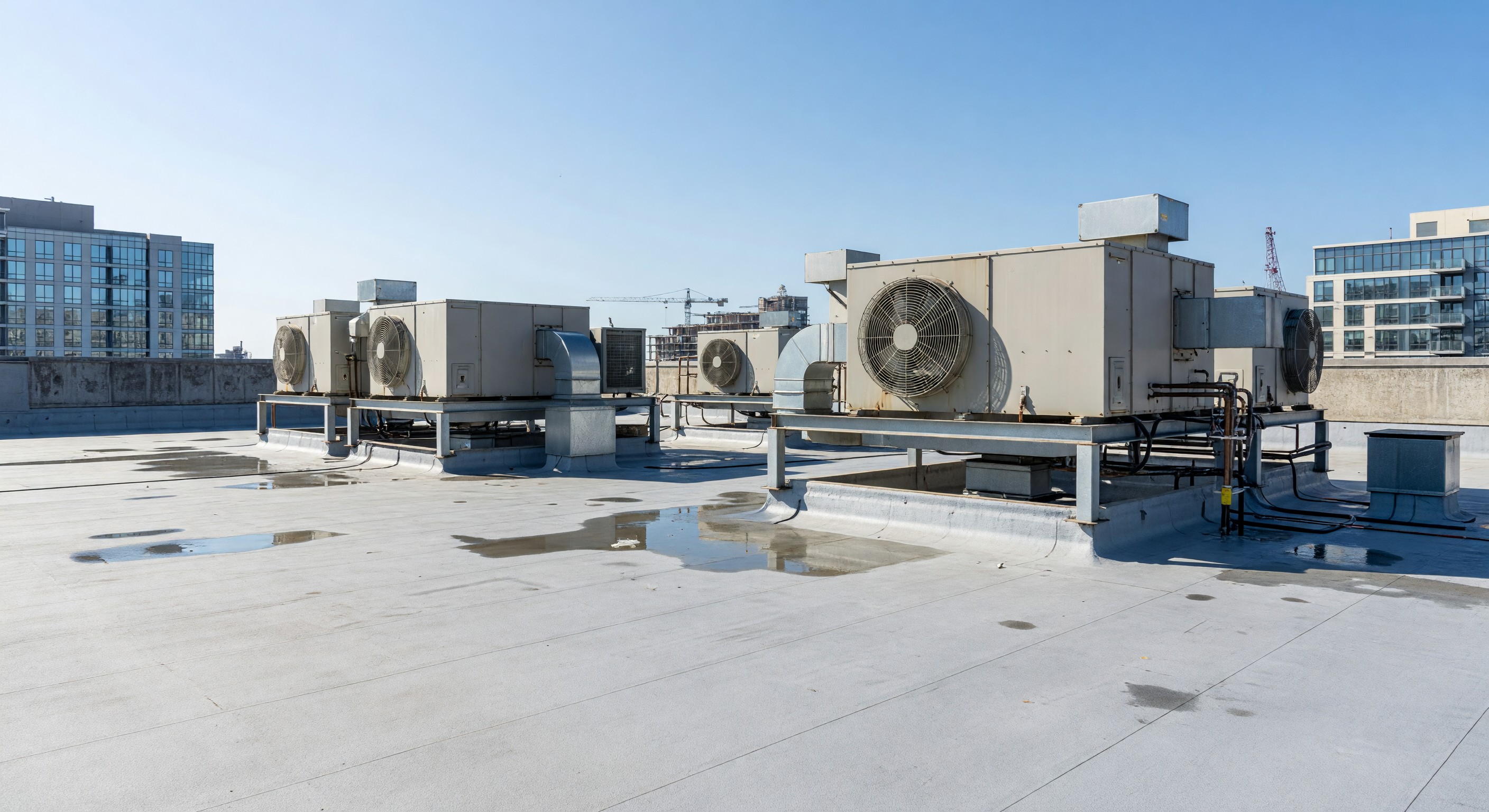 Hotel rooftop with HVAC equipment and roof membrane